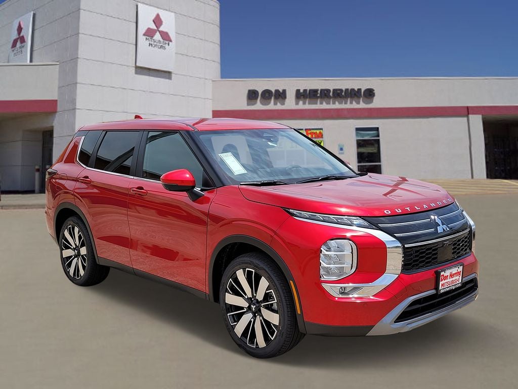 2026 Mitsubishi Outlander SE in Red Diamond — front three-quarter view