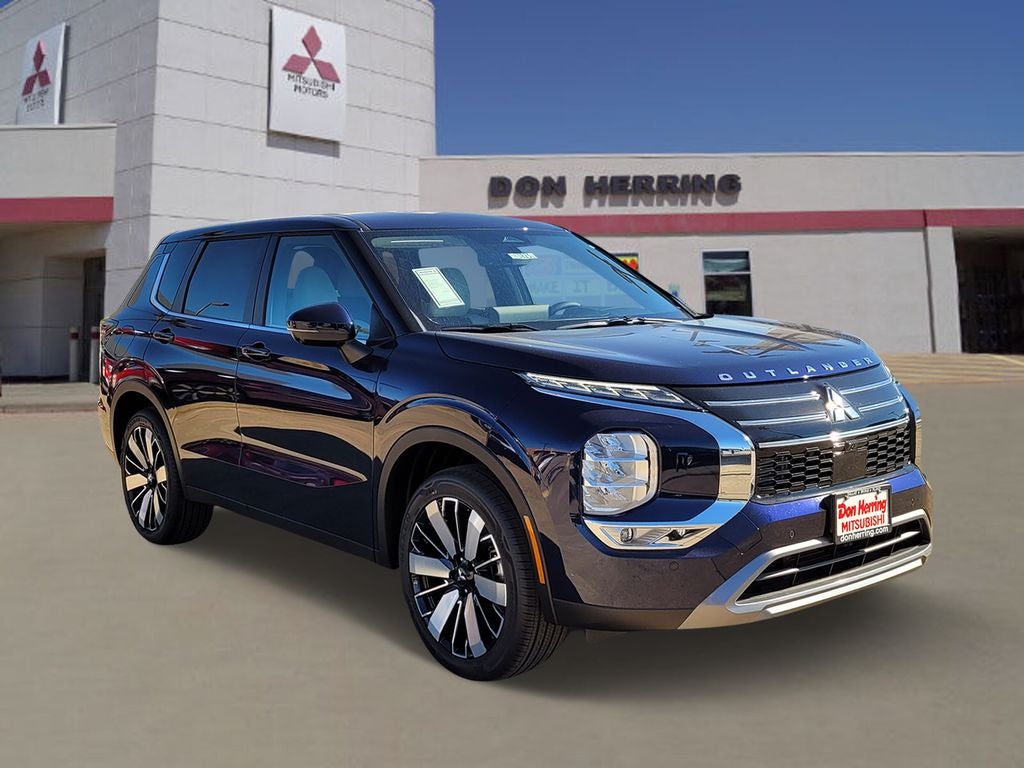 2026 Mitsubishi Outlander SE in Cosmic Blue Metallic — front three-quarter view