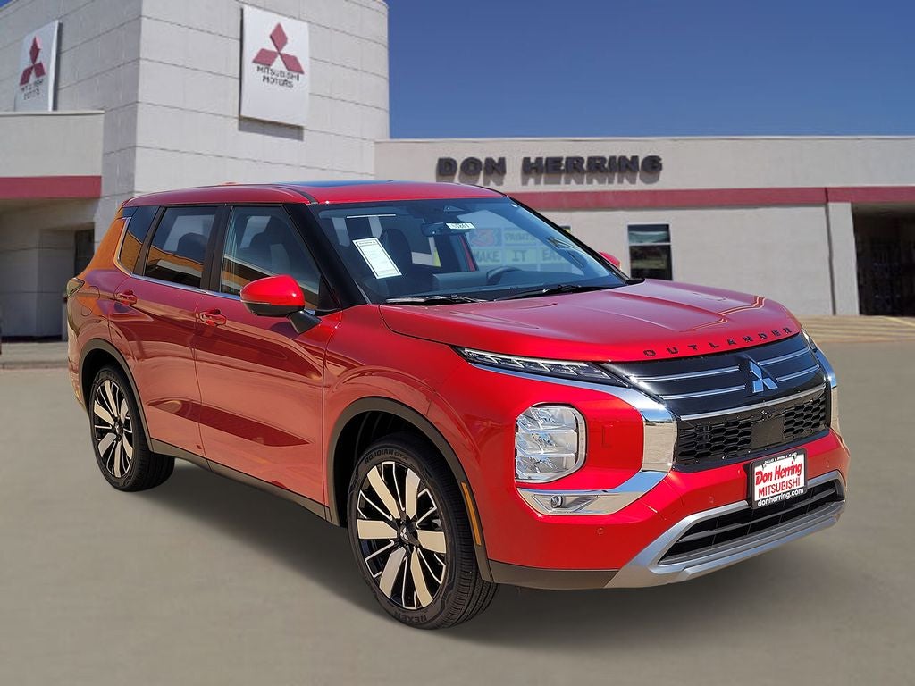 2026 Mitsubishi Outlander SE in Red Diamond — front three-quarter view